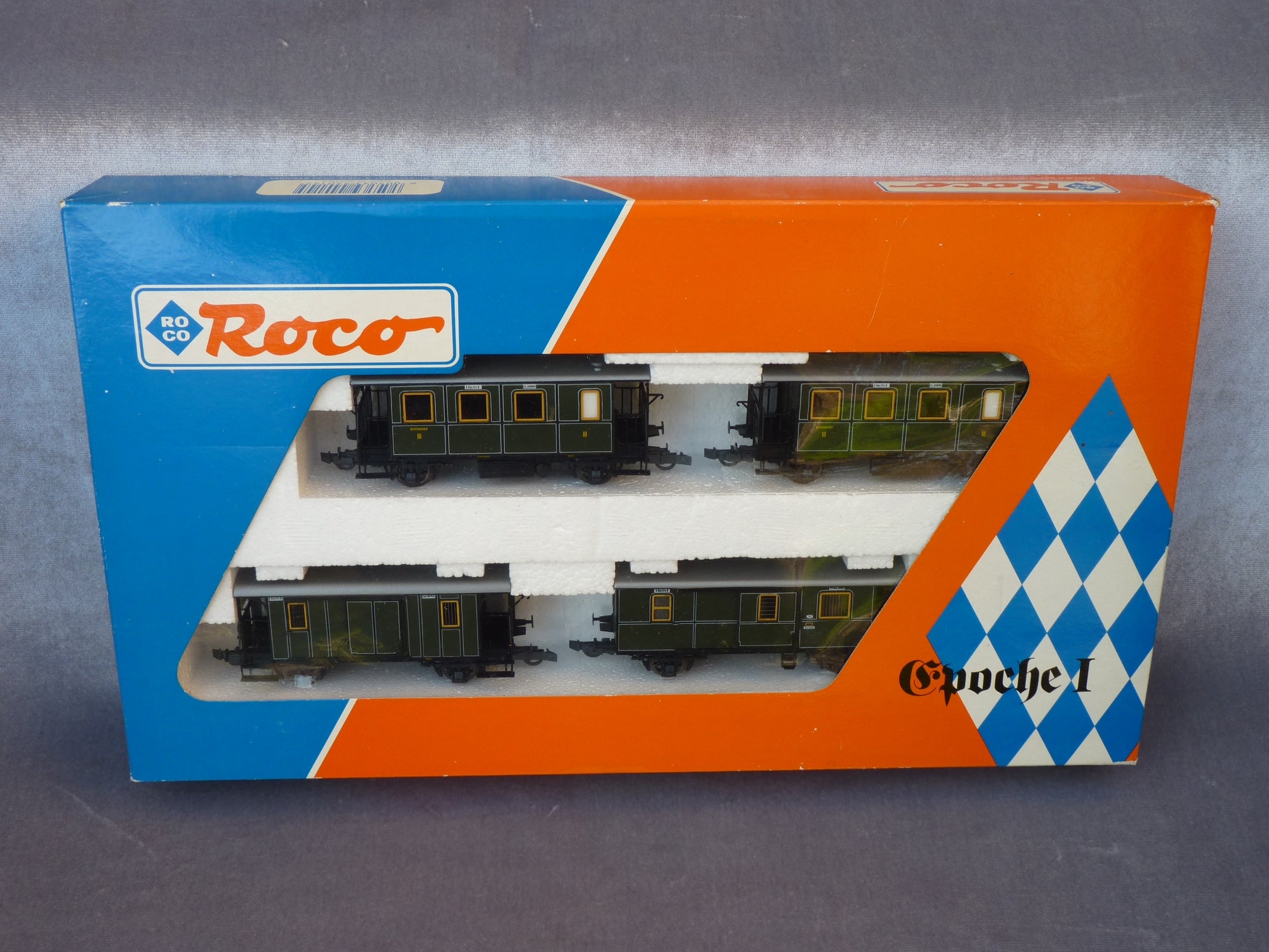Quatre voitures voyageurs de marque Roco - Réf. : HO 44012 Quatre voitures voyageurs de marque Roco - Réf. : HO 44012